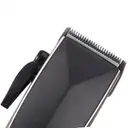 Фото 3 — Професійна машинка для стрижки волосся від мережі VGR V-033 USB Pro, 9 Вт з насадками 3-12 мм і ножицями в комплекті