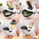 Photo 2 — Овощерезка - мультислайсер с корзиной 9 в 1 WET BASKET VEGETABLE CUTTER Многофункциональная ручная терка-шинковка с емкостью