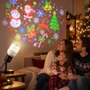Фото 2 — Новогодняя LED-лампа-проектор / Лампочка 4 Вт с праздничными световыми узорами / Светодиодная лампа с проекциями E27