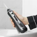Фото 2 — Іригатор портативний Waterpik Cordless Advanced Water Flosser WP-562, чорний