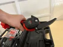 Photo 2 — Kraftech KT/BCD-360i Cordless Mini Chainsaw with 2 Batteries, Case Included