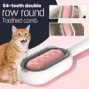 Фото 2 — Щітка для вичісування шерсті тварин 4 в 1 Pet Cleaning Comb, з масажем та чисткою речей, рожева W28