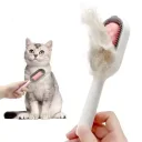 Фото 5 — Щітка для вичісування шерсті тварин 4 в 1 Pet Cleaning Comb, з масажем та чисткою речей, рожева W28