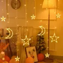 Фото 5 — Гірлянда-штора зорепад із місяцем, 2.5 м, 138 LED, 12 зірок, 220В